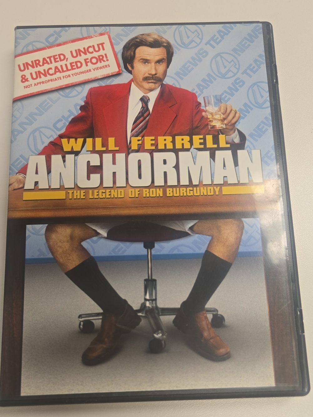 Dreamworks Anchorman DVD Cover – Red Jacket, Yellow Title, Blue Background